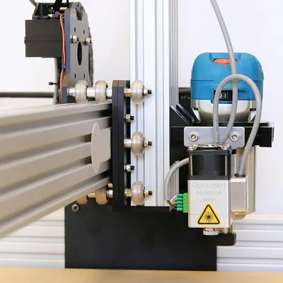 Budget laser engraver under 500 dollars in a maker workshop for wood and leather engraving projects